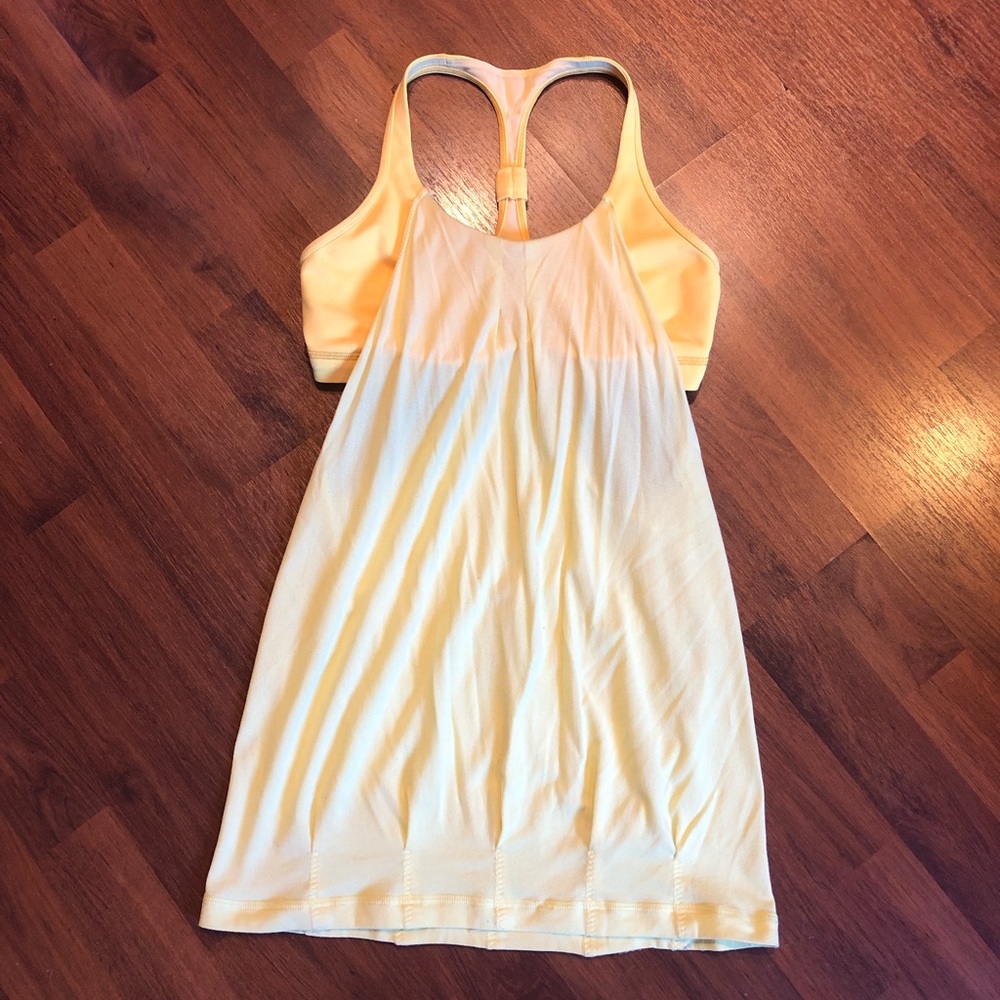 Lululemon Tank Top w/ Sports Bra. Size 6. Color is a light Yellow